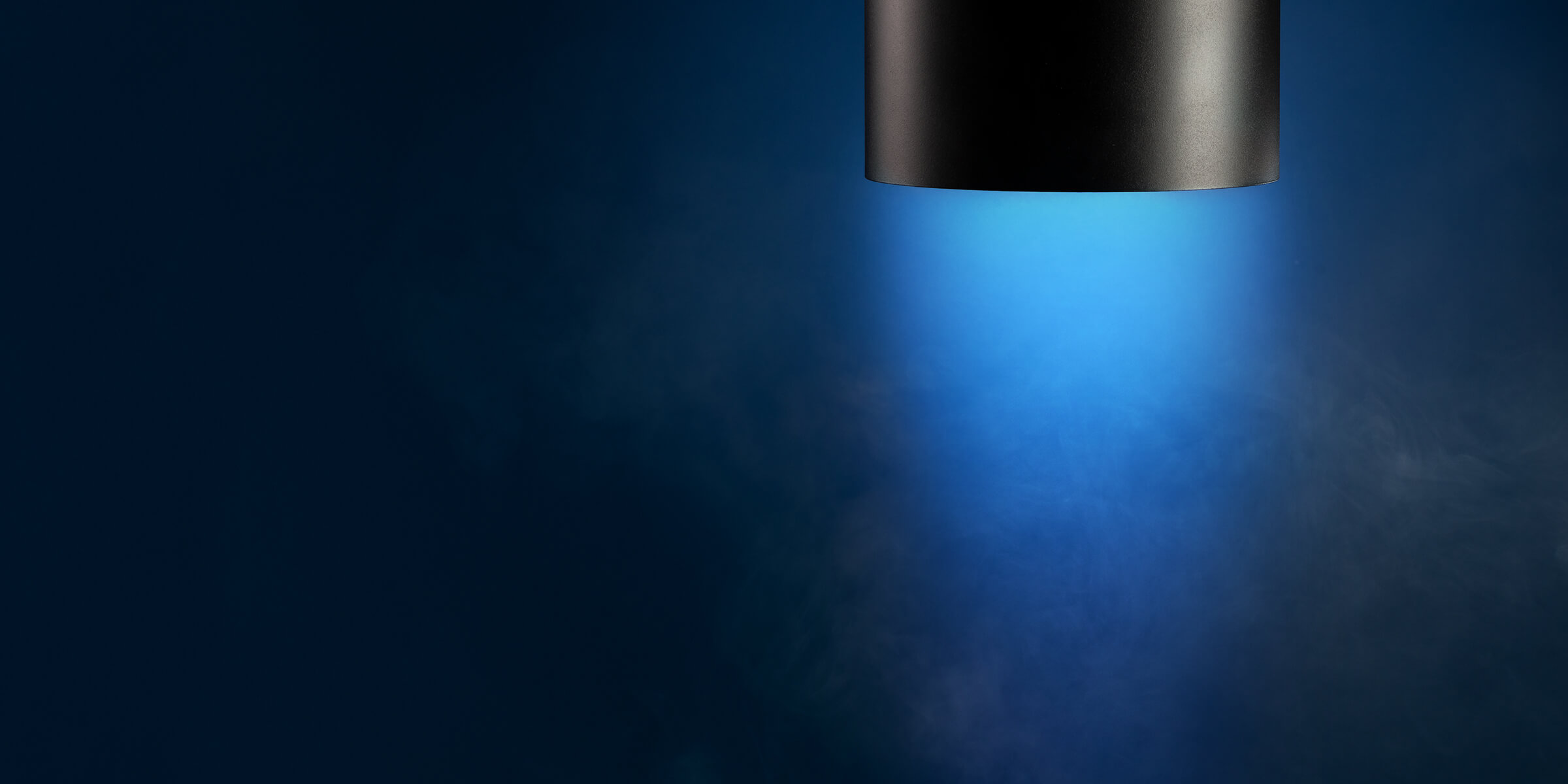 dramatic Axceleron downlight with smokey blue background